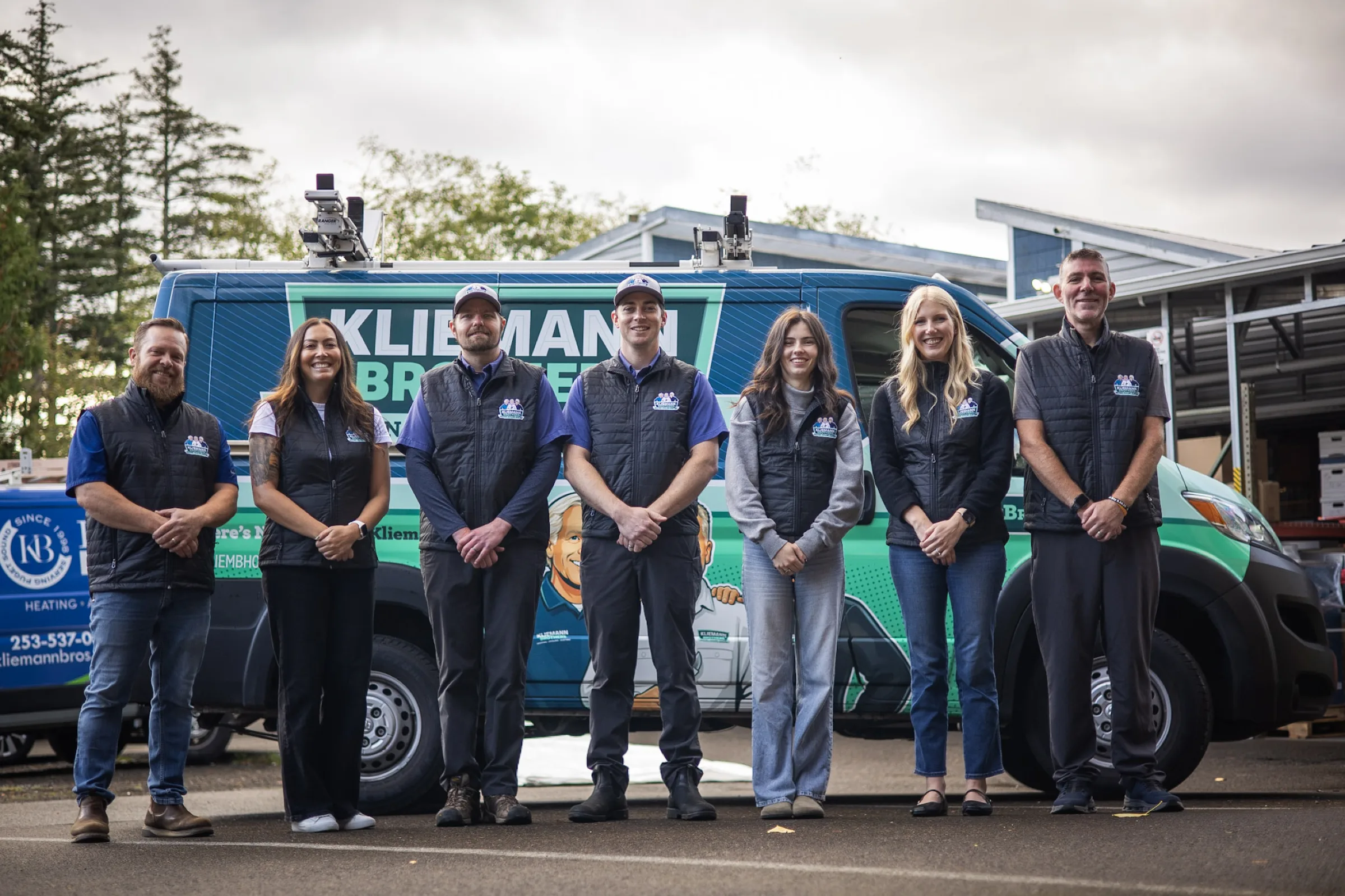 Kliemann Brothers team members meeting with a homeowner