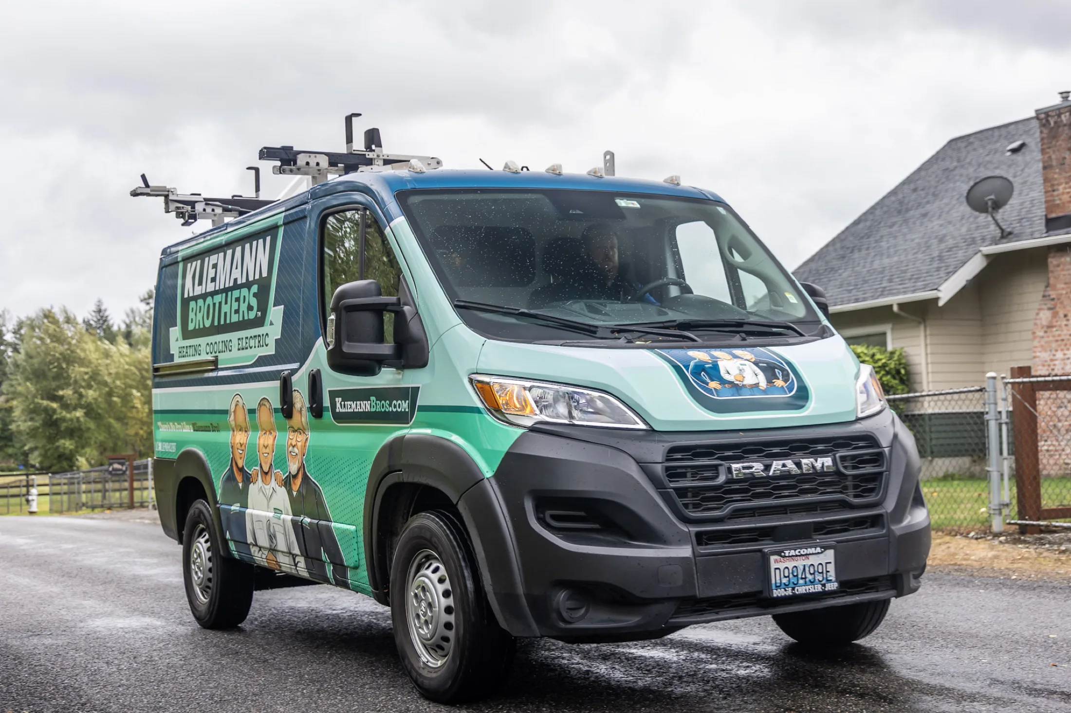 A Kliemann Brothers van outside a home in the south Puget Sound