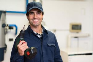 HVAC Tech with Drill
